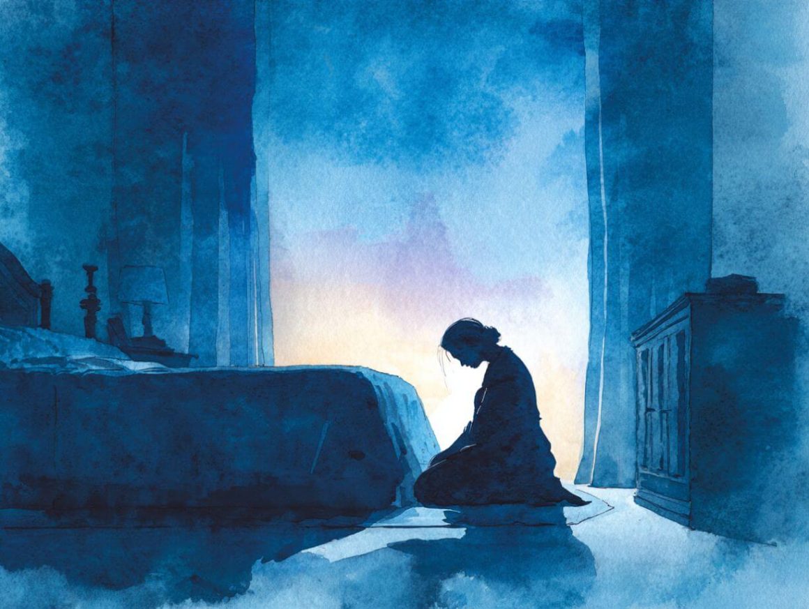 Woman praying at the end of the day